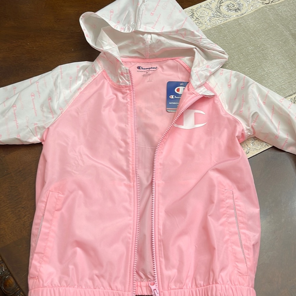 Girls windbreaker size M color pink , brand new with tags